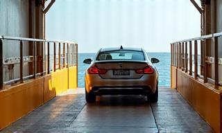 Car driving onto a ferry deck during boarding
